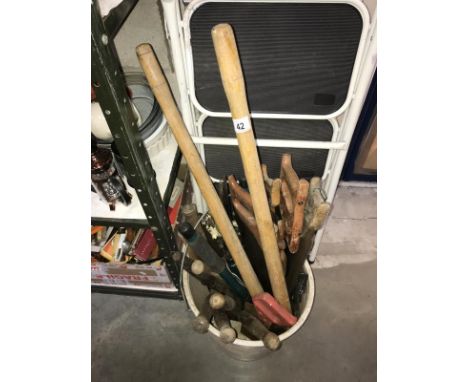 A bucket of garden tools &amp; wood saws