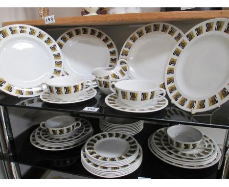 A vintage Ridgeway dinner service on 2 shelves