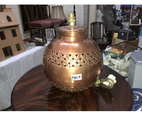 A large art copper table lamp.