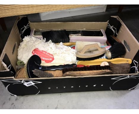 A box of vintage shoe shine &amp; other brushes