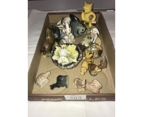 A mixed lot of china animals including Royal Doulton, Beswick, Wade, Goebel etc.,