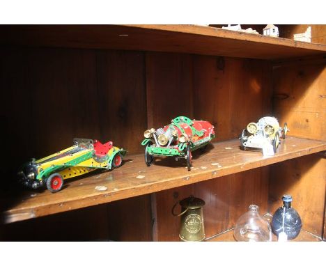 Three Meccano model cars