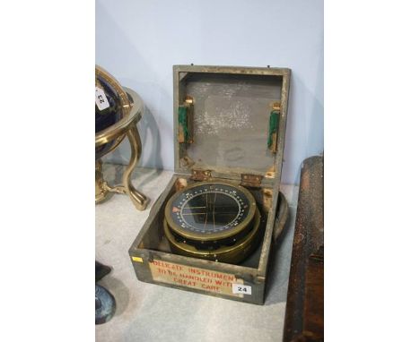 A cased P10 compass