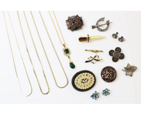 An assortment of lady's vintage and costume jewellery, to include, a Victorian carved bone brooch, a small early 20th century