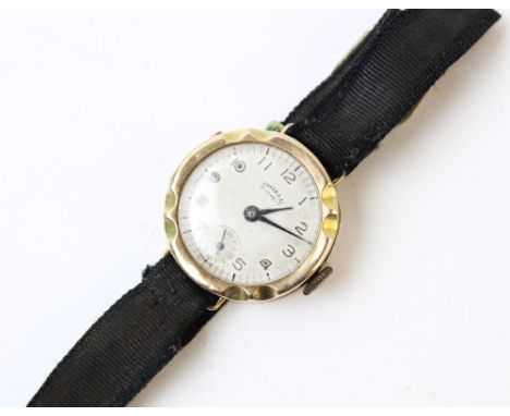 A Lady's vintage 9ct gold wristwatch, the circular cream dial with Arabic numerals and subsidiary seconds dial to six 'o' clo