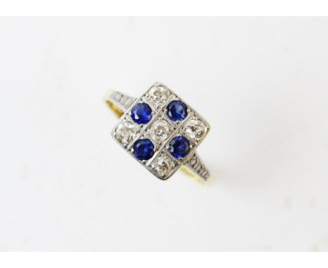 An early 20th century diamond and sapphire square cluster ring, comprising five old cut diamonds interspersed with four mixed