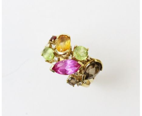 A multi-gem set ring, the 'tutti frutti' style ring, set with citrine, smokey quartz, peridot and diamonds, all set in 18ct y