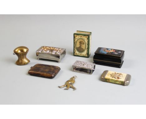A selection of assorted vestas, snuff boxes and novelty cigar cutter, to include an erotic brass vesta in the form of a corse