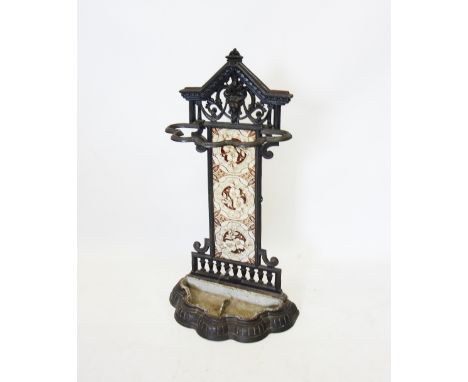 A Victorian cast iron Coalbrookdale type stick stand, the cast openwork pediment stamped with a registration no. 60228, above