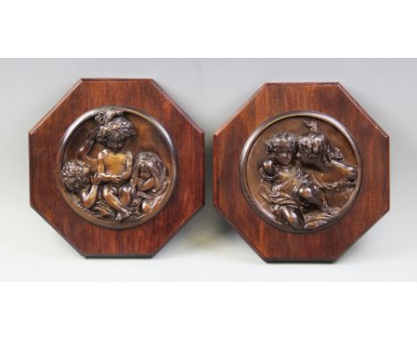 A pair of late 19th century plaques, after Sir Joshua Reynolds by E.W.Wyon published 1848/49, bronze patinated copper, mounte