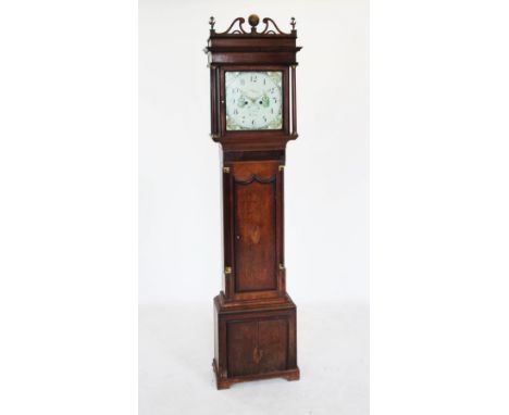 A George III oak and mahogany cross banded eight day long case clock by J Calcott, Cotton, with tapering pilasters flanking t