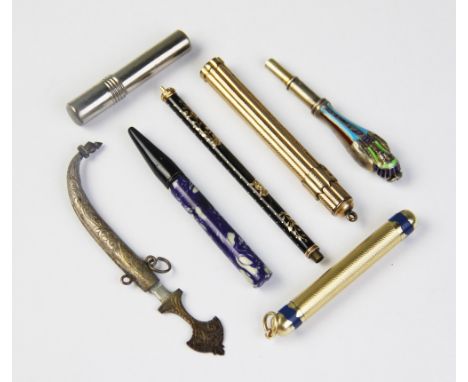 Five vintage mechanical pencils, including yellow metal and Egyptian style examples, the longest 8.5cm long, with a screw top