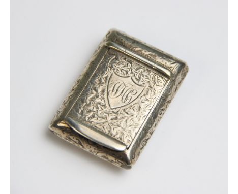 A Victorian silver snuff box, Minshull &amp; Latimer, Birmingham 1894, of cushion rectangular form with ivy leaf decoration a