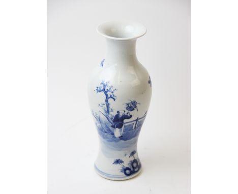 A Chinese blue and white begonia vase, 19th century, the vase of typical baluster form in the Kangxi style, hand decorated in