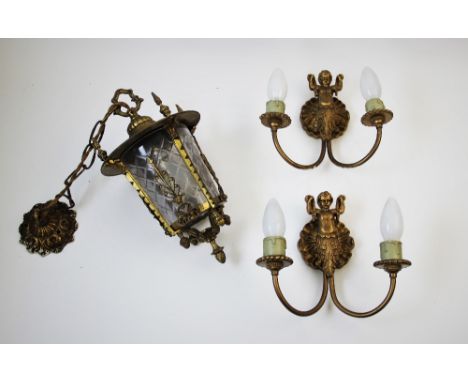 A gilt brass and cut glass lantern ceiling light, late 19th/early 20th century, the lantern frame with notched corner posts w