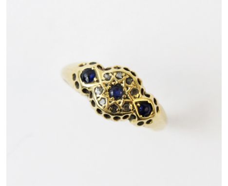 Victorian sapphire and diamond cluster ring, comprising a central mixed cut round sapphire with a cluster surround of eight r