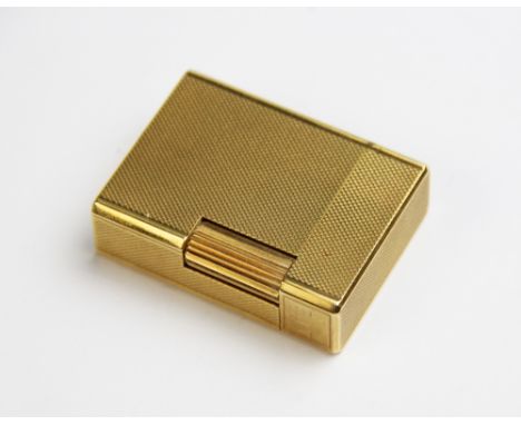 A Dupont of Paris gold plated lighter, of rectangular form with engine turned decoration to exterior, engraved initials to co