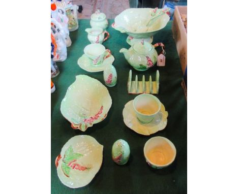 A collection of eighteen Carltonware, to include: teapot, toast rack, cup, saucers, salad bowl, servers and other items.