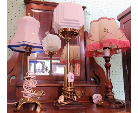 A 20th century brass table lamp with Art Deco shade, together with two further table lamps.