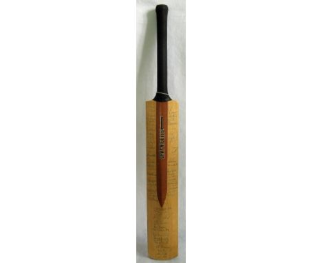 A Gray-Nicolls cricket bat, signed by the Australian and various English cricket teams, Middlesex and Essex amongst others, s