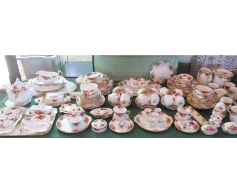 An extensive Royal Albert Old Country Roses dinner service, comprising: dinner plates, side plates, graduated meat plates, te