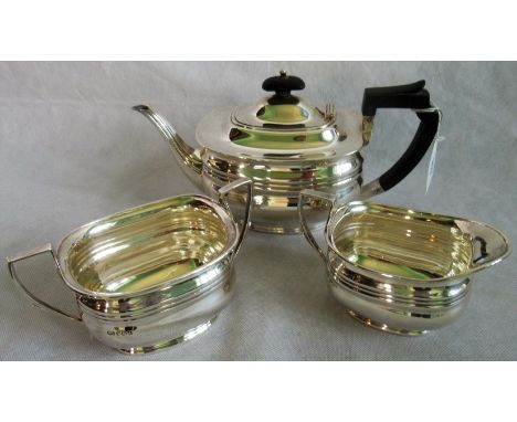 A 20th century hallmarked tea service, comprising: teapot, sugar bowl and milk jug, various dates.