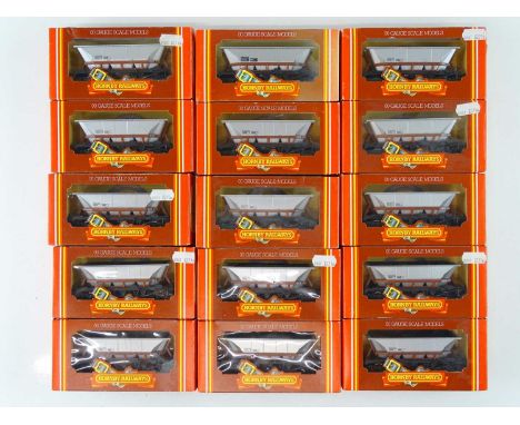 A large group of HORNBY R238 OO Gauge Merry-Go-Round Hopper Wagons together with one R249 - VG in G boxes (15)