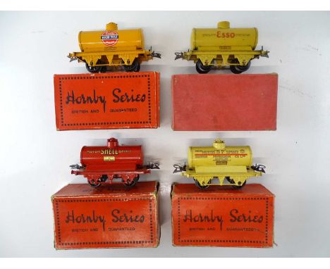 A group of HORNBY SERIES O Gauge pre-war tank wagons comprising Esso, BP and Pratts examples - G in G boxes (4)