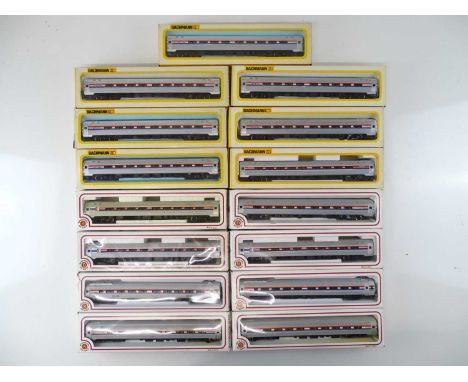 A large group of BACHMANN American Outline HO Gauge Budd passenger coaches - all in Amtrak livery - G/VG in F/G boxes (15)