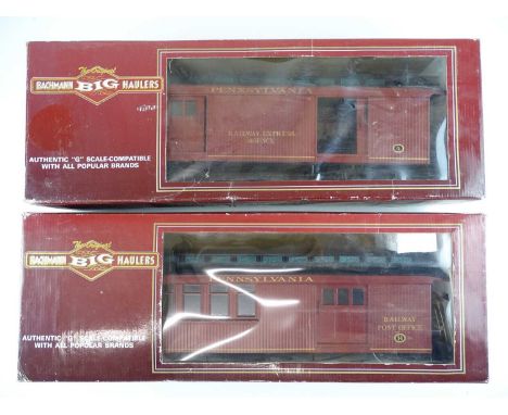 A pair of BACHMANN American outline G Scale coaches comprising a baggage car and combine car both in Pennsylvania RR livery -