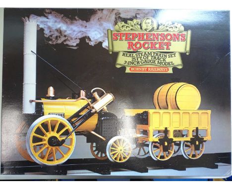 A Hornby 3.5 inch scale G100 live steam Stephenson's Rocket train set complete with track and loco - appears to be in good co