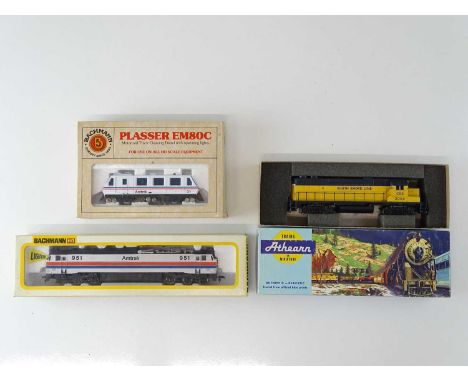 A mixed group of HO Gauge American Outline diesel and electric locomotives by ATHEARN and BACHMANN - G in F/G boxes (3)