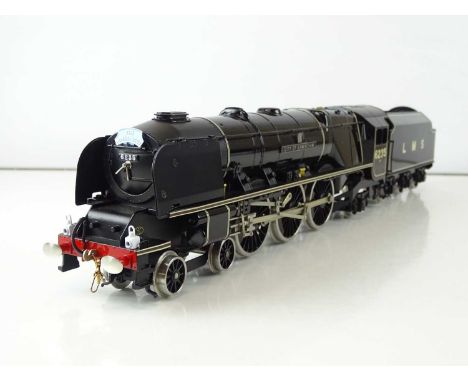 An ACE TRAINS O Gauge 2/3 rail Duchess class steam locomotive in LMS black livery "City of Birmingham" with semi-streamlined 