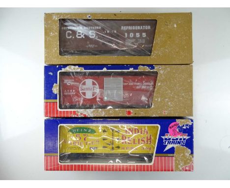 A group of American outline G Scale box cars by USA TRAINS - G/VG in P/F boxes (3)