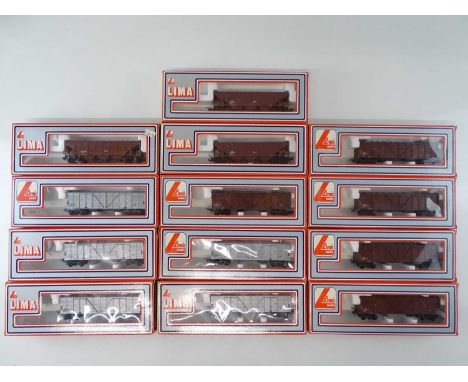 A group of South African outline HO Gauge LIMA hopper wagons and box vans as lotted - VG in G boxes (13)