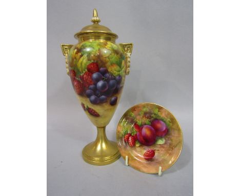 A Royal Worcester Blush Ivory urn shaped vase and cover with painted grape, strawberry and blackberry decoration signed MH Pr