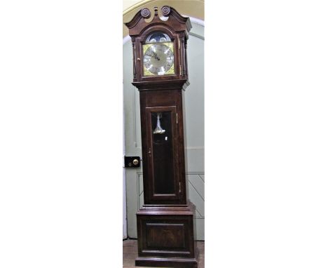 An oak longcase clock, the hood with swan neck pediment enclosing a broken arch dial, 27 cm, the chapter ring with applied nu