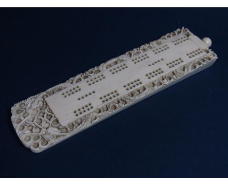 19th century Chinese Ivory wedge shaped cribbage or games counter, to the borders entwined snakes (the button end unscrews to