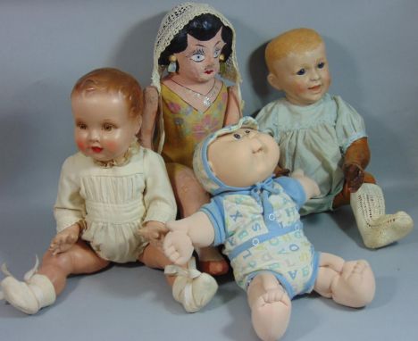 1950's composition doll by Deans Rag Book Co with moulded hair, painted features and 5 piece body height 41cm together with a