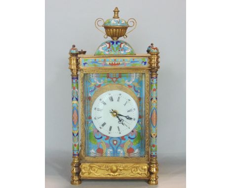 Impressive cloisonne clock case with bevelled glass and various inlaid panels, twin handled urn mount, painted enamel panels 