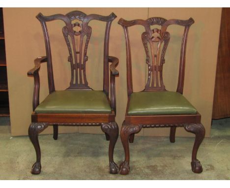 A set of six (4&amp;2) Chippendale revival dining chairs with pierced and scrolled gothic tracery splats over drop in seats r