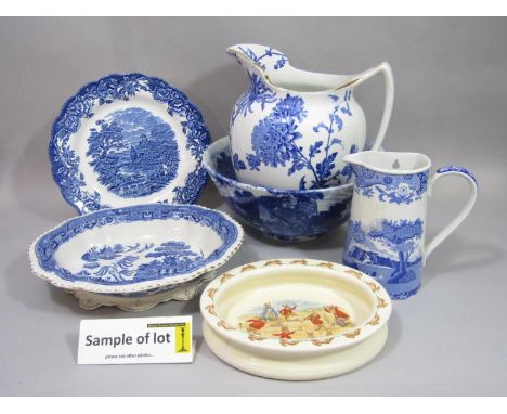 A quantity of blue and white printed wares including Copeland Spode Italian pattern flatback wall hanging jug, a matching tea