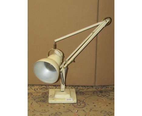 A vintage Herbert Terry anglepoise table lamp with two stepped square base and cream colourway 