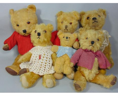 5 vintage teddy bears with golden fur, all with stitched noses, glass eyes and jointed bodies and one similar miniature bear,