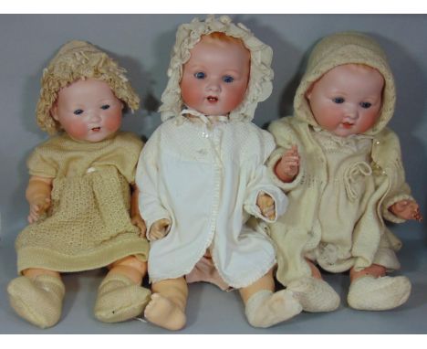 3 bisque head baby dolls by Armand Marseille, all with 5 piece bent limb composition bodies; firstly a 'Dream Baby' mold 351/