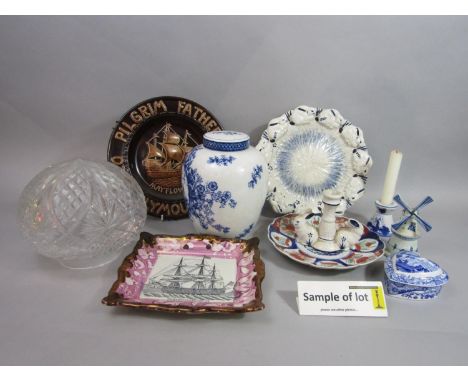 A collection of ceramics including 19th century and later oriental dishes including imari type examples, a 19th century plaqu