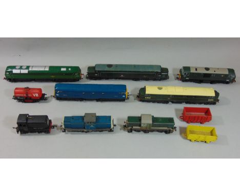 Mixed collection of unboxed model trains including HO gauge Fleischmann switcher 212 381-8, unmarked switcher D5935, Hornby C
