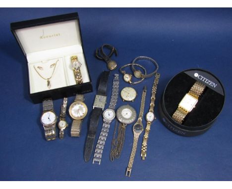 A mixed collection of various vintage gents and ladies watches to include a cased Citizen quartz dress watch with date apertu