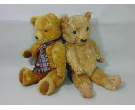 Chad Valley teddy bear circa 1930 with red stitched label on foot, height 52cm, with stitched mouth, nose and claws and (repl