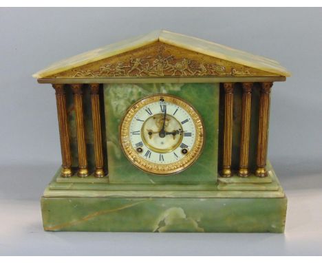 Green onyx and gilt metal architectural twin train mantle clock, in the form of a corinthian temple, with battle scene to the
